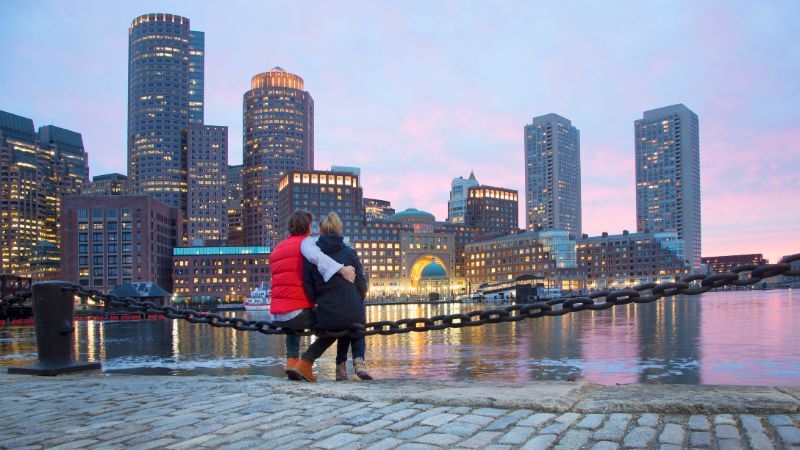 Couple by the river in Boston